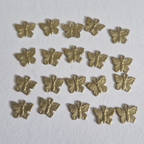 Butterfly pendant brass - x,