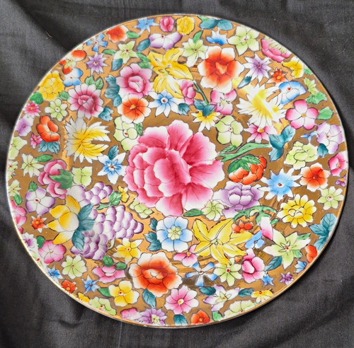 Unmarked round floral - unmarked,