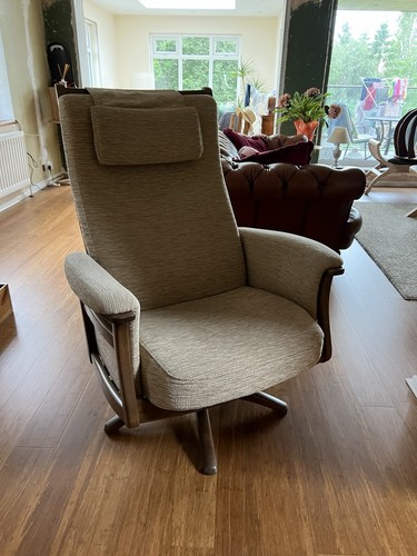 Ercol chair and foot stool - and,