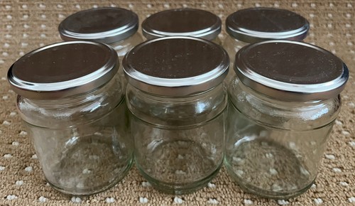 Empty glass jam jars - jam, lids
