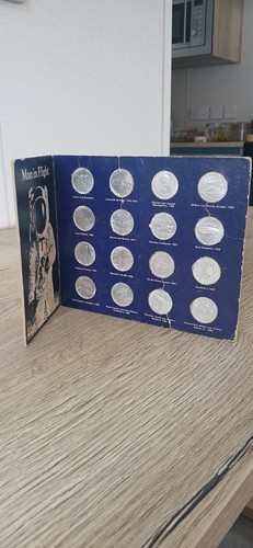 Man flight coin collection - man,