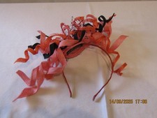 LOUISE BURNETT FASINATOR IN