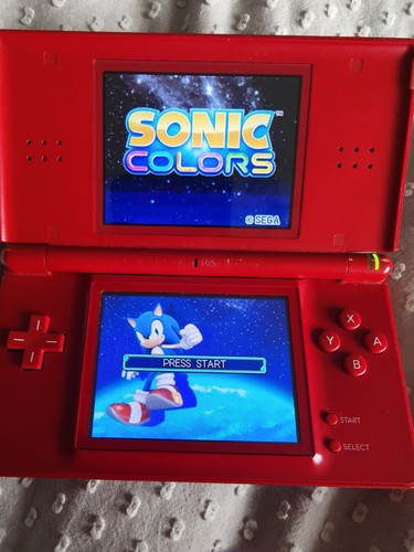 Nintendo red handheld game - ds,
