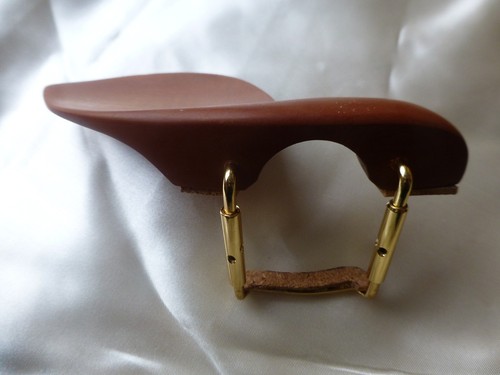 Brown violin chin rest with - chin,