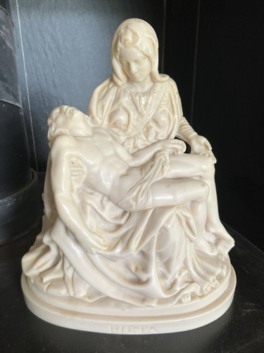 Pieta sculpture mary holding - sculpture,