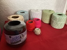 9 reels of crochet cotton, mixed colours. 