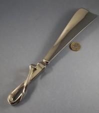 A Fine Quality Equestrian Shoe Horn With Horseshoe Style Nail Handle