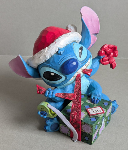 Disney traditions stitch - traditions,