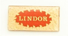 C155) Enamel Lindor Chocolate confectionery food advertising badge lapel pin