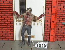 The Walking Dead Unboxed Action Figure - Zombie Biter - #1019