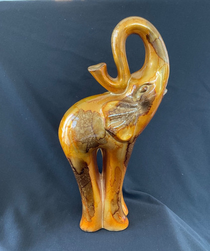 Striking elepant figurine - striking,