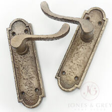 PAIR OF ANTIQUE AGED BRASS HAMMERED SCROLL LEVER LOCK DOOR HANDLES ON BACK PLATE
