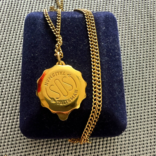 Sos talisman gold tone round - tone,