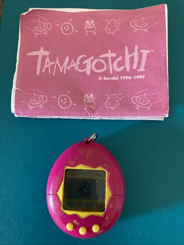 Bandai tamagotchi 1997 pink - tamagotchi,