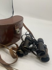 vintage binoculars in leather