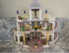 Beautiful vintage Playmobil castle with lots of characters and furniture