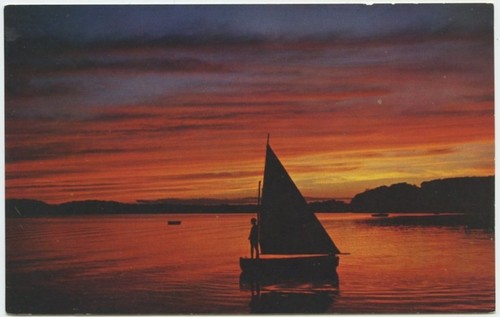 Sunset over sailboat - over, in