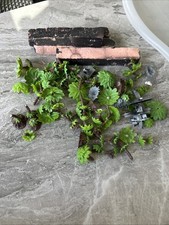 Vintage miniature terrain pieces, which are commonly used in tabletop wargames