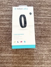 Fitbit Alta Fitness Tracker (unused, but needs replacement battery cost £7.99)