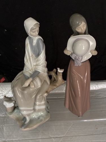 Lladro figures with slight - figures,