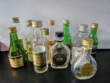 11 empty Brandy miniature