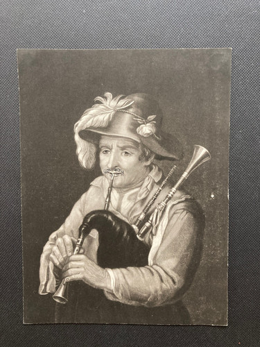 Man playing bagpipes small