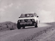 VOLKSWAGEN GOLF, IN RALLY ACTION PHOTOGRAPH.