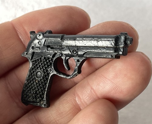 Vintage action figure pistol - action,