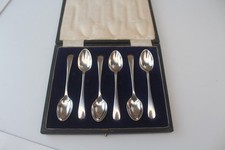 H F & Co Silver plated spoons.