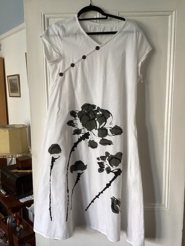 Whit cotton dress with flower