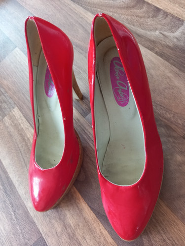 Red stilettos high heel shoes