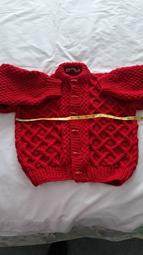Hand knitted aran round - hand,