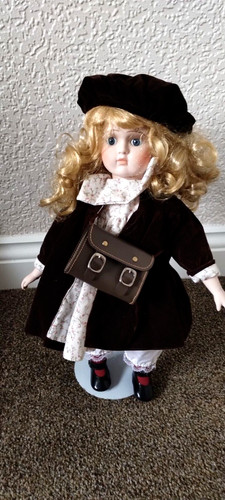 Porcelain doll dressed - dressed, her