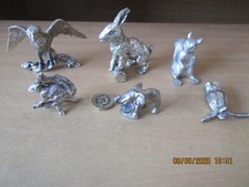 SILVER PLATE?    EAGLE,  HARE,  SQUIRREL, OWL, ELEPHANT + SQUIRREL ON TREE