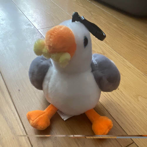Grey white orange plush - &,