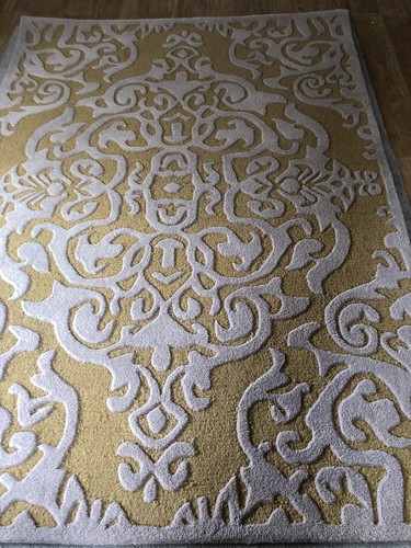 Large gold wool - rug, .