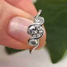 Round Cut Moissanite Three