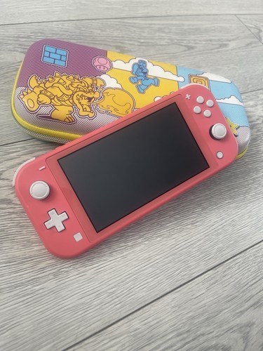 Nintendo switch lite pink - nintendo,
