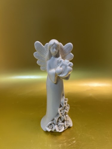 White porcelain angel - a,