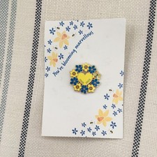 MARIE CURIE CHARITY BADGE -75