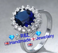 C1C: Woman White Gold* Ring. Size N-O. Oval Blue & White Lab Created Sapphire