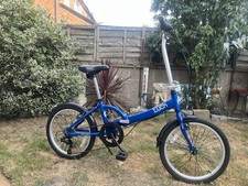 Apollo Tuck folding bike with storage bag