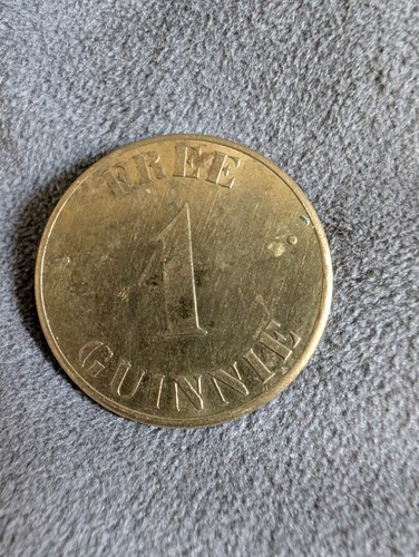 Guinness promotional token - guinness,