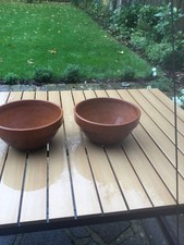 Two matching Italian classic ribbed terracotta planter bowls