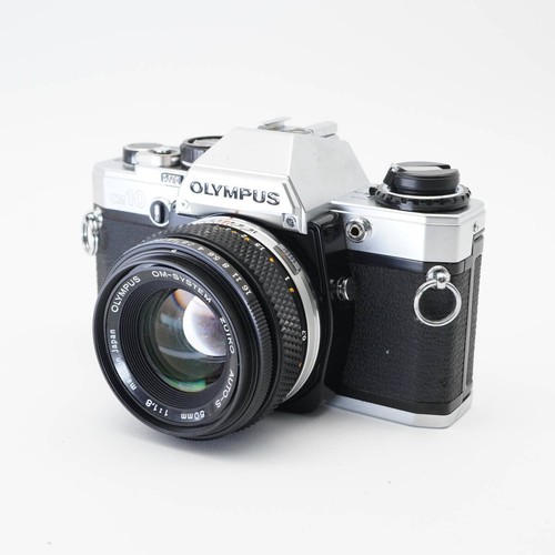 Read near mint olympus om - [near,