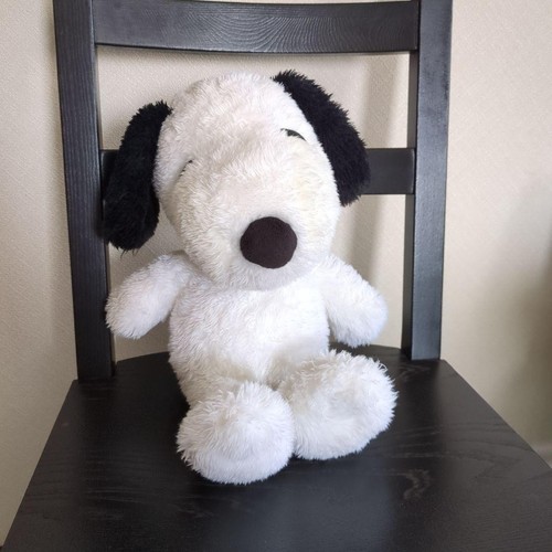 Snoopy stuffed animal with red