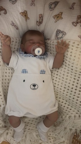 Weighted reborn baby doll - ,