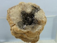 INTERESTING GEODE _ cubic metallic crystals inside a geode.