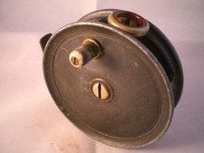 A  VINTAGE PATTERN 1 TROUT FLY REEL FOR ALEX MARTIN + RED AGATE