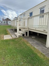 Static caravan with - caravan, decking